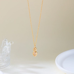 Elegant gold-layered necklace with double pink champagne teardrop zircon pendants