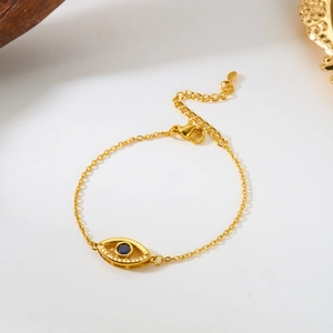 Golden Evil Eye necklace with blue zircon pendant and fine adjustable chain link