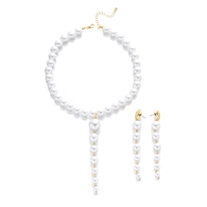 Elegant vintage pearl necklace and tassel earrings set with gold chain accents