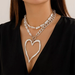 Baroque pearl and silver chain layered necklace with a large molten heart pendant