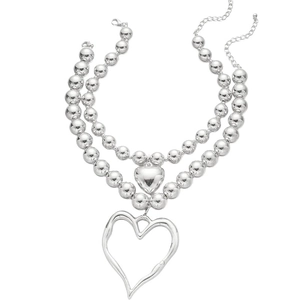 Detail of silver double-layered bead necklace with irregular heart-shaped pendants