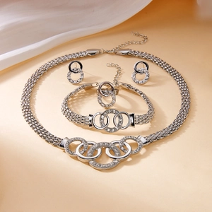 Elegant 5-piece silver jewelry set with interlocking crystal rings and mesh chains