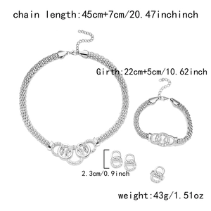 Detail showing braided mesh chain and intertwined pavé ring necklace, bracelet and earrings
