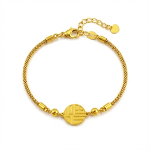 Elegant gold-tone mesh chain bracelet featuring a round Fu character pendant for women