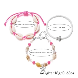 Three-piece bohemian ocean jewelry set with starfish, turtle, and shell charms