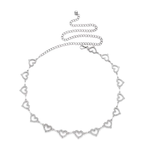 Detailed view of silver heart-shaped waist chain with hollow links and adjustable lobster clasp
