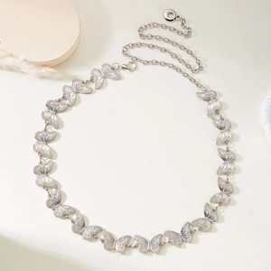 Detailed silver butterfly chain waist belt with adjustable links and lobster clasp