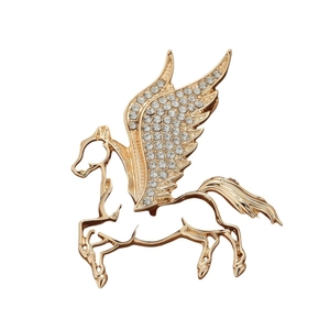 Luxurious gold Pegasus brooch with sparkling crystals and elegant flying horse design