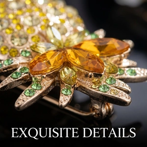 Detailed macro view of an exquisite crystal pineapple brooch with vibrant golden stones