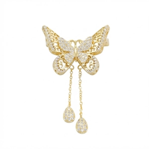 Elegant hollow butterfly brooch with tassels and crystal pendants in golden finish