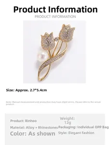 Détail de la broche tulipe dorée avec strass et perle montrant la taille 2,7*5,4 cm