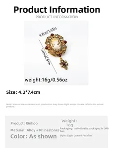 Detailed view of vintage cameo brooch with dimensions 4.2cm by 7.4cm and rhinestone trim