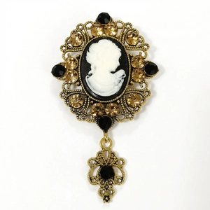 Detailed retro cameo brooch with hollow gold filigree and amber rhinestones detail