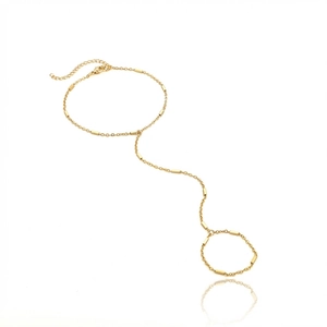 Bracciale ad anello minimalista dorato con catena sottile e accenti metallici rettangolari