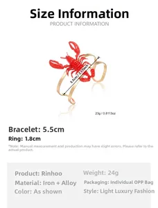 Detail of creative gold metal lobster bracelet showing 5.5cm diameter and red finish