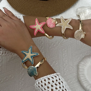 Colorful starfish and seashell gold bangles with enamel coating for beach vacations