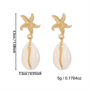 Detail view showing starfish stud and cowrie shell drop earrings with dimensions