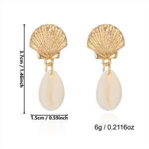 Detail view of beach style cowrie shell earrings with gold seashell studs and dimensions