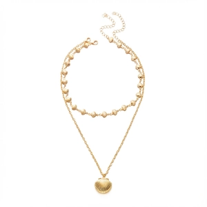 Double-layered gold seashell and scallop pendant necklace with polished finish