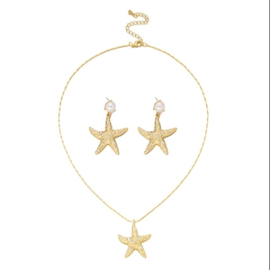 Golden starfish jewelry set with sparkling crystals and elegant white pearls