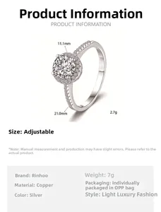 Detail view of silver halo ring featuring adjustable copper band and sparkling cubic zirconia