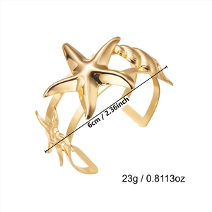 Detailed view of starfish shell arm bracelet with 6cm diameter and 23g weight specs