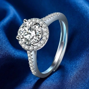 Luxurious four-prong halo ring with a round brilliant diamond-cut stone and adjustable band