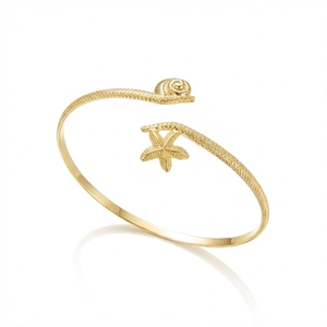 Bohemian gold starfish and seashell open arm cuff with textured metal finish for women