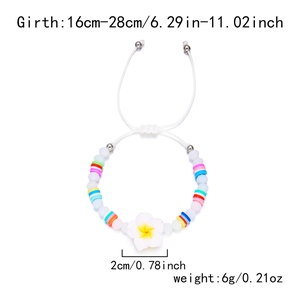Detail view of colorful plumeria flower bracelet with adjustable cord and clay beads