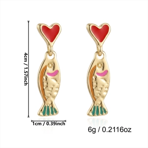 Detail view of 4cm seahorse drop earrings with red hearts and colorful enamel finish