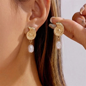 Golden conch shell earrings with baroque pearls for beach style fashion
