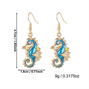Enamel seahorse dangle earrings in gold with blue stones and dimensions display