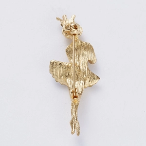 Detailed back view of a ballet girl brooch showing the secure pin clasp and metal texture