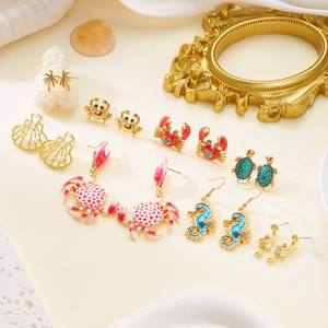 Chic ocean themed earrings set with colorful enamel seahorse crab and turtle designs