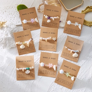 Neun-teiliges Ozean-Armband-Set mit Seestern- und Muschel-Anhängern auf Wunschkarten