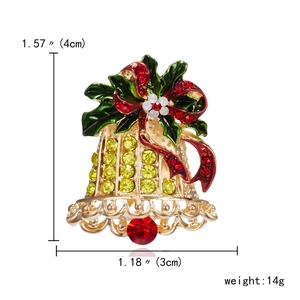 Weihnachtsglocken-Brosche mit grünen Stechpalmenblättern, roter Schleife und Maßen