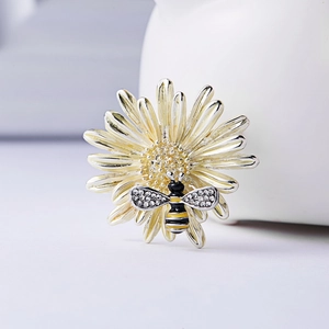 Elegant bee on sunflower brooch with yellow enamel petals and sparkling crystals