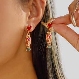 Fashionable gold-plated goldfish dangle earrings with red heart studs and enamel details