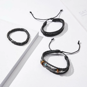Adjustable 4-piece men's set featuring leather braided bracelets with leaf and bead charms