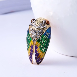 Exquisite golden cicada brooch with colorful enamel wings and sparkling rhinestones
