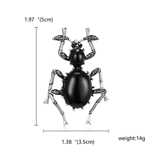 Vintage beetle insect brooch with black oval gemstones and crystal embellishments