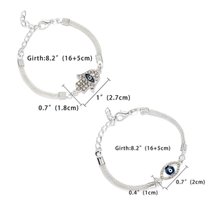 Dettaglio dei braccialetti Hamsa e Occhio del Male in argento con misure e chiusura