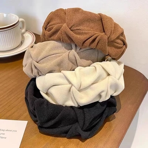 Pleated twisted knit wide headband in brown, khaki, beige, and black colors