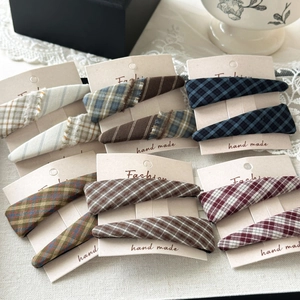 Set of sweet plaid fabric triangle hair clips in navy, brown, and green patterns