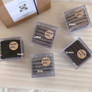 5-piece satin scrunchie set in earth tones with matching gift box and bag packaging