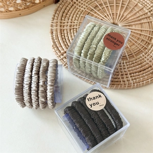 Three-color satin scrunchies set in green and brown colors with gift packaging box
