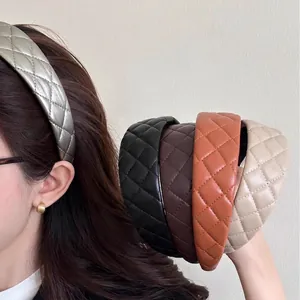Quilted faux leather headband for women in assorted retro colors with a padded design