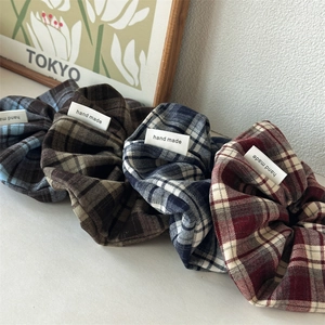 Set of four retro plaid fabric hair scrunchies with hand made labels in dark vintage colors