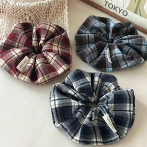 Three vintage plaid scrunchies in burgundy, blue and navy with handmade fabric tags
