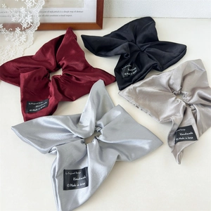 Elegant satin scrunchies set in burgundy black blue and grey with handmade label
